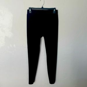 Women’s black stretch pants.  Medium